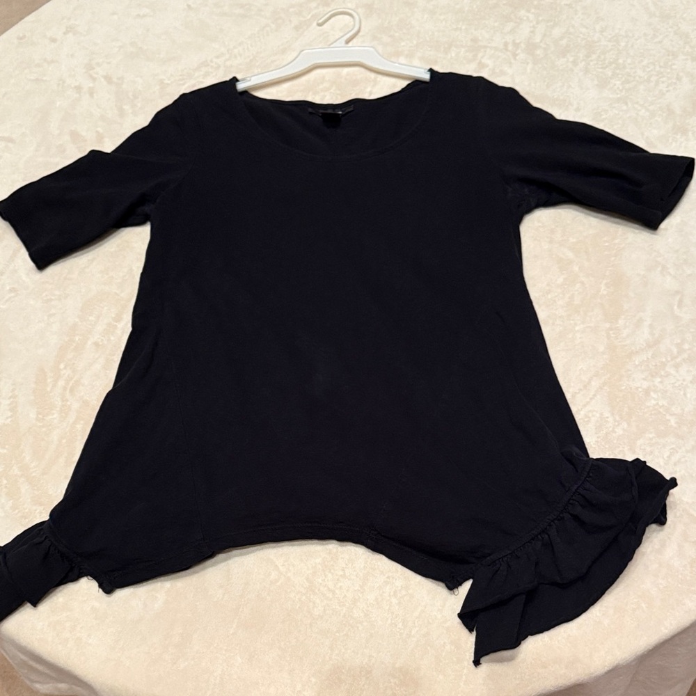 Women’s black ruffled shirt